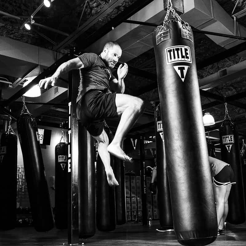 Mixed Martial Arts Lessons for Adults in Falls Church VA - Flying Knee Black and White MMA